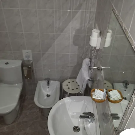 Отель Camargo